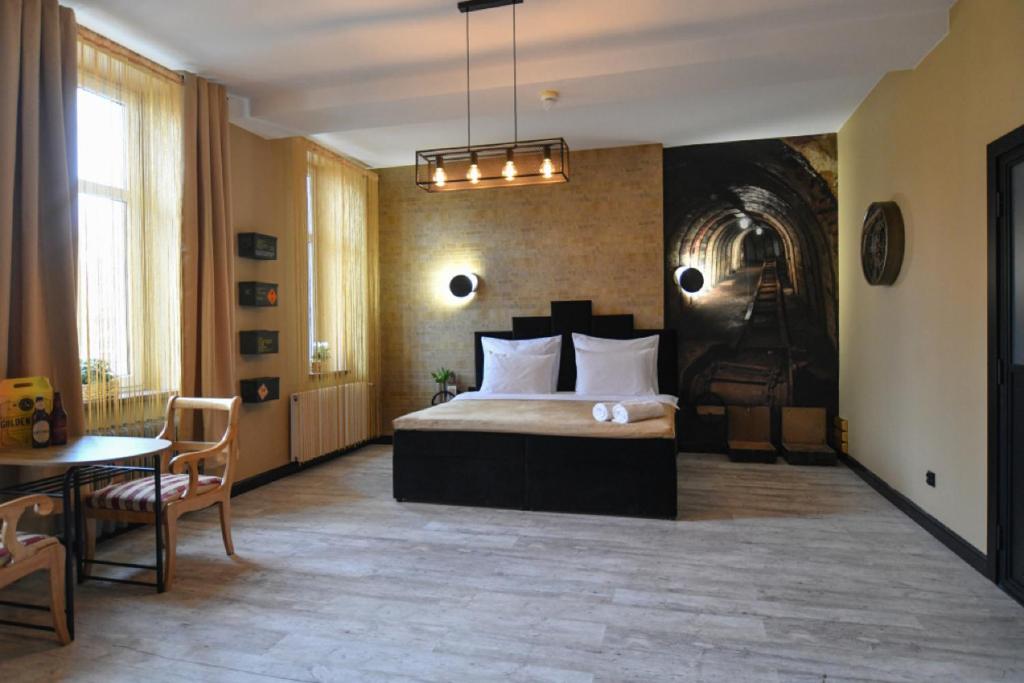 Posteľ alebo postele v izbe v ubytovaní Apartament ZłotyPociąg przy Zamkowej w Wałbrzychu