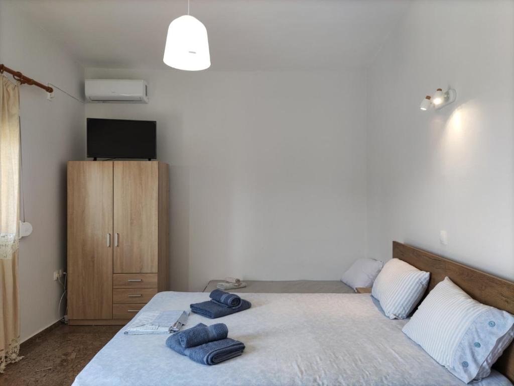 Krevet ili kreveti u jedinici u objektu Sunlit Shores Apartment
