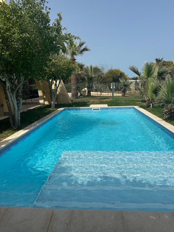 Bazén v ubytování Penthouse cosy avec piscine privée nebo v jeho okolí