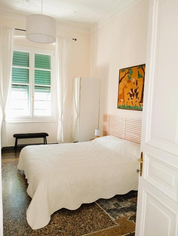 Postel nebo postele na pokoji v ubytování I MUSETTI guesthouse