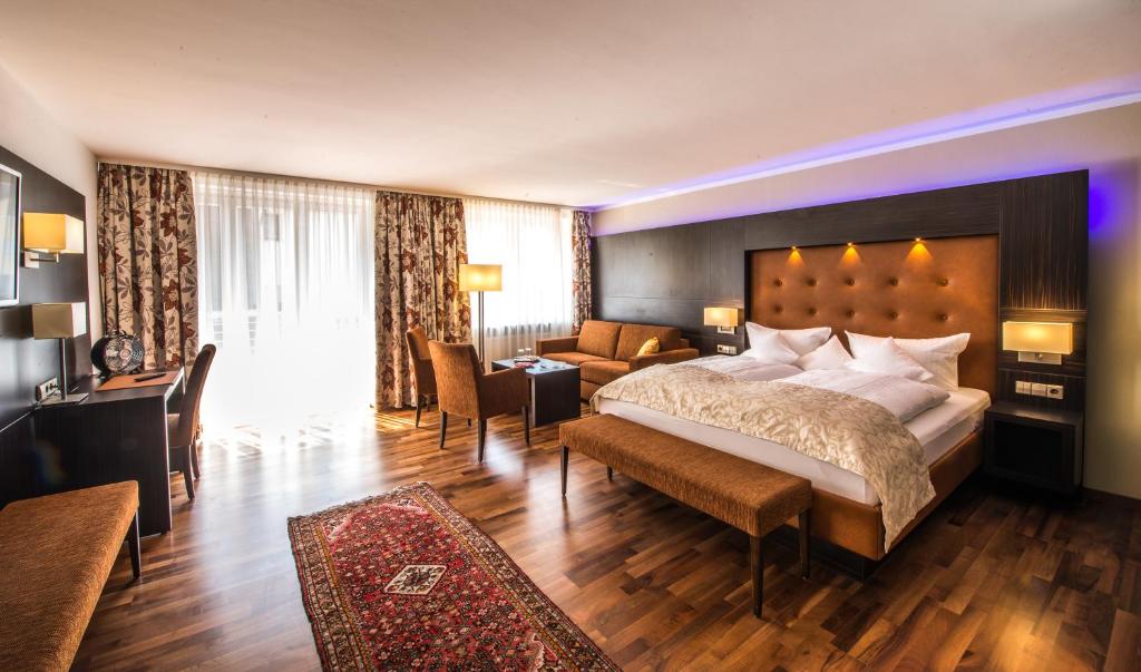 Postel nebo postele na pokoji v ubytování Hotel am Yachthafen