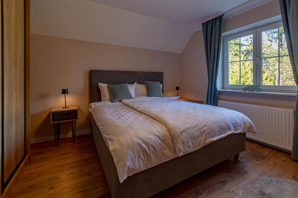 Postel nebo postele na pokoji v ubytování GREEN ViEW APARTMENTS