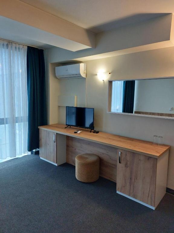 TV a/nebo společenská místnost v ubytování Hotel Fors