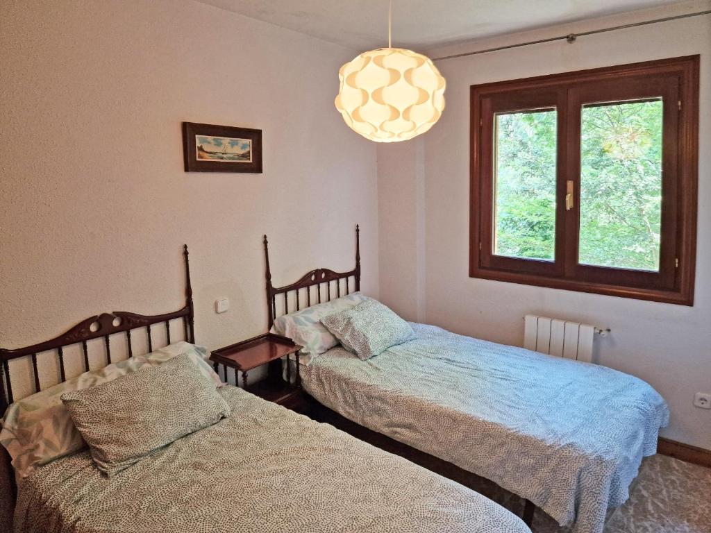 Posteľ alebo postele v izbe v ubytovaní Villa Rural Cantabria
