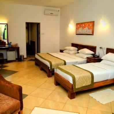 Postel nebo postele na pokoji v ubytování Spring Villas Kandy