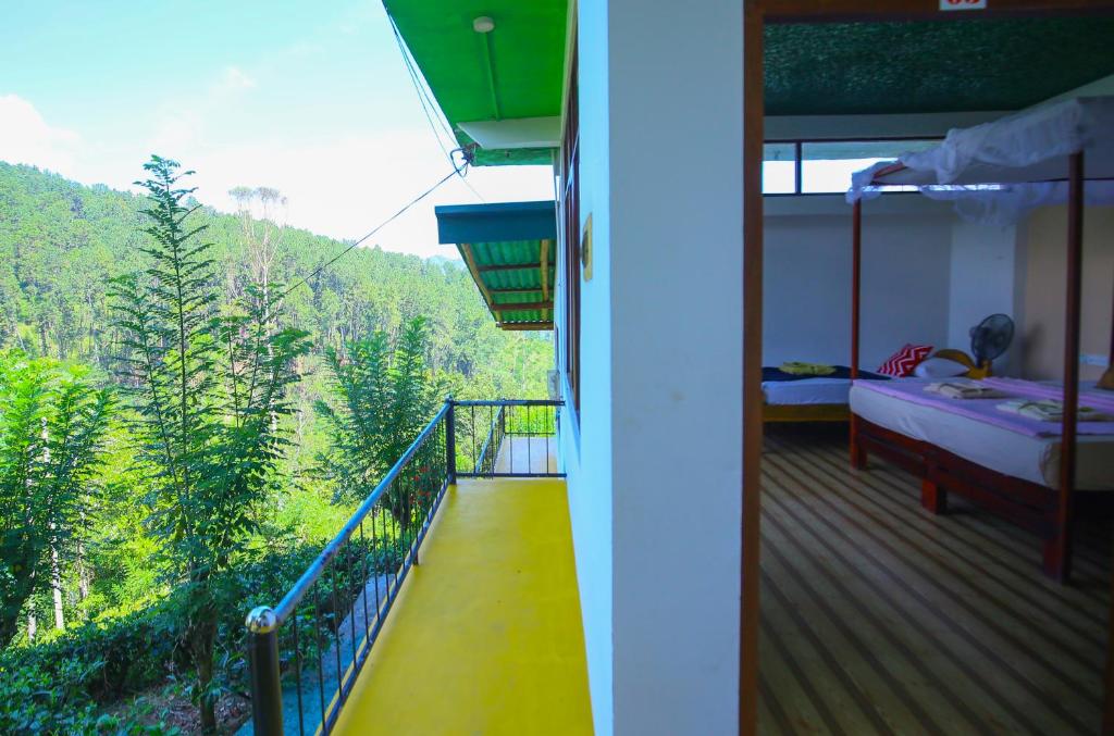 Postel nebo postele na pokoji v ubytování Ella Nine Arch lodge