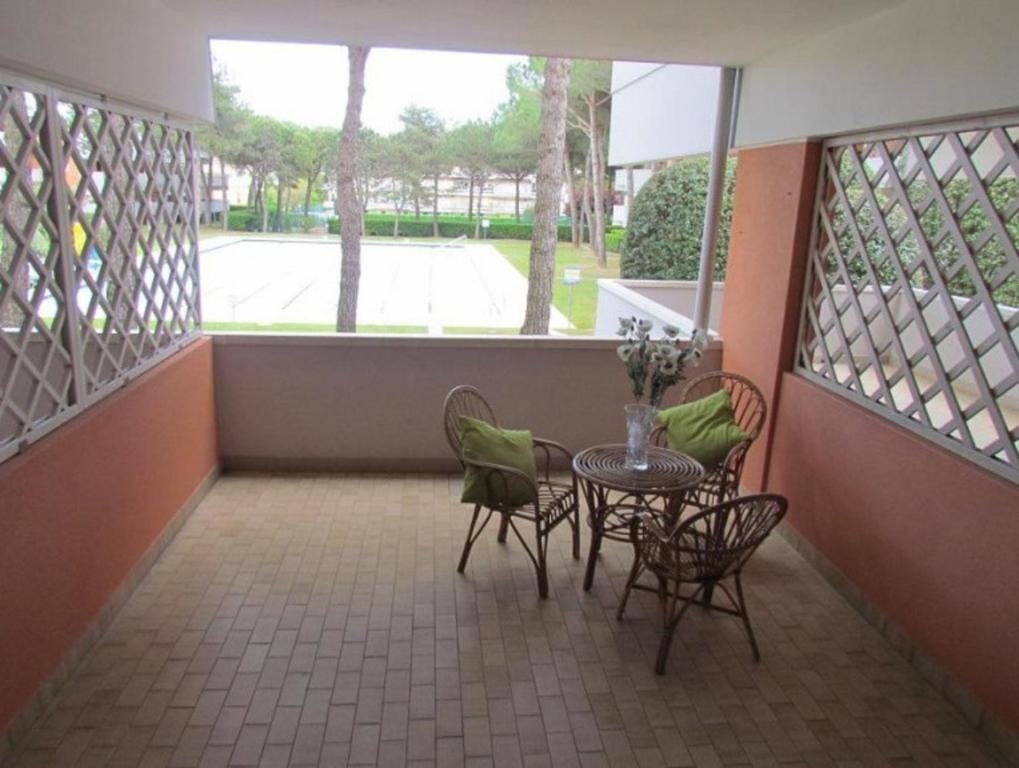 A seating area at Nice Apartment with Pool and Tennis court - Beach Place Included by Beahost