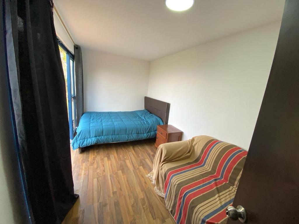 Postel nebo postele na pokoji v ubytování Hotel Campestre los Duraznos