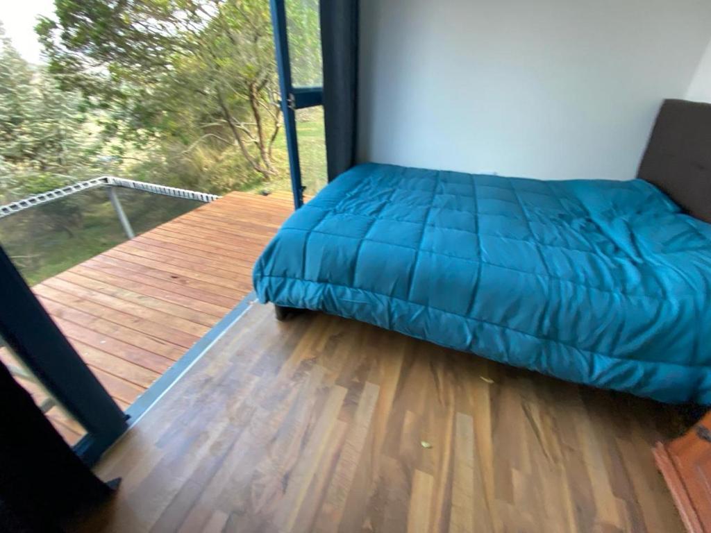 Postel nebo postele na pokoji v ubytování Hotel Campestre los Duraznos