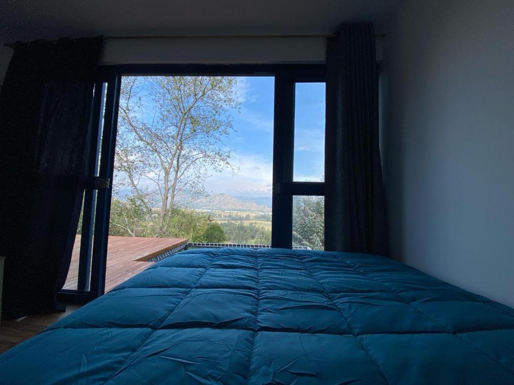 Postel nebo postele na pokoji v ubytování Hotel Campestre los Duraznos