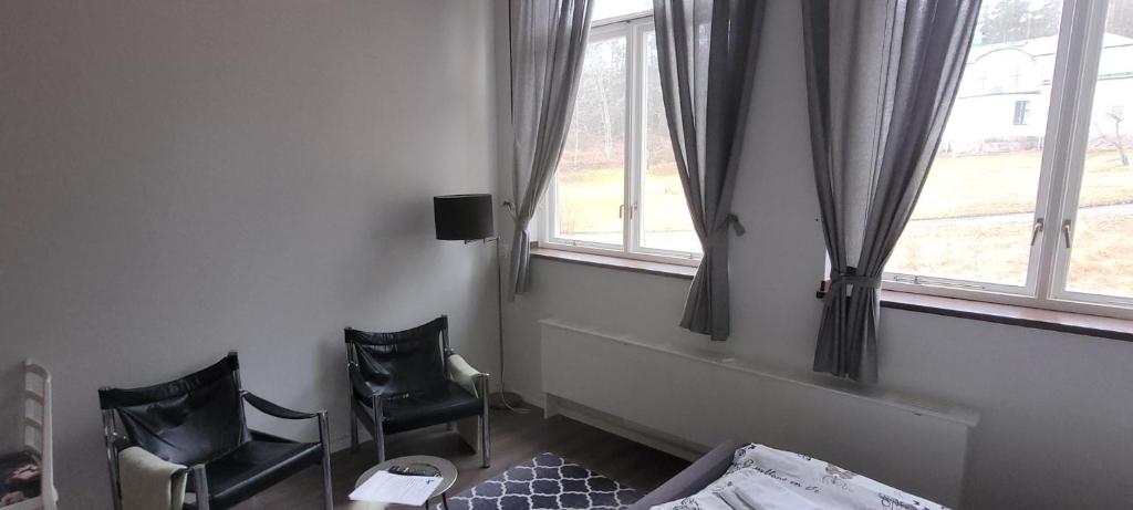 TV a/nebo společenská místnost v ubytování Skeppsgården B&B