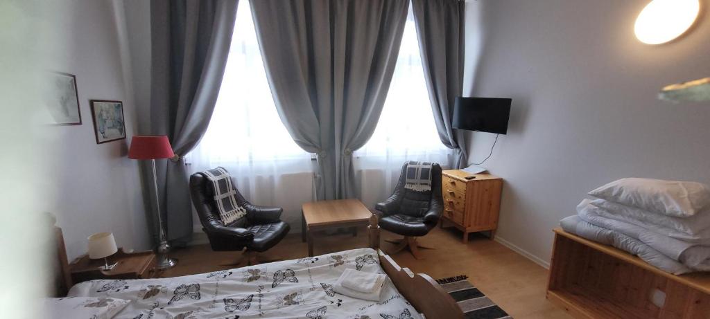 Postel nebo postele na pokoji v ubytování Skeppsgården B&B