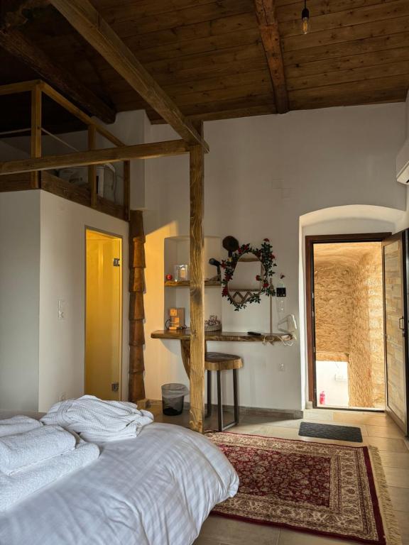 Postel nebo postele na pokoji v ubytování Èlia Luxury Rooms