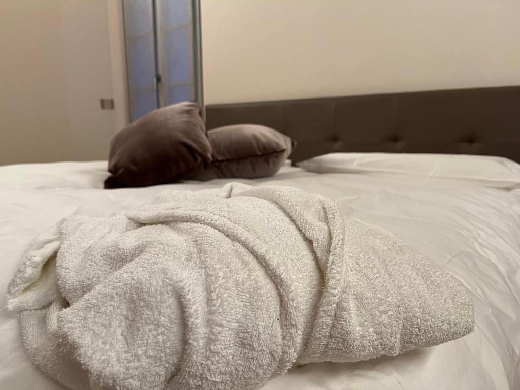 Postel nebo postele na pokoji v ubytování PALMANOVA SUITE HOME