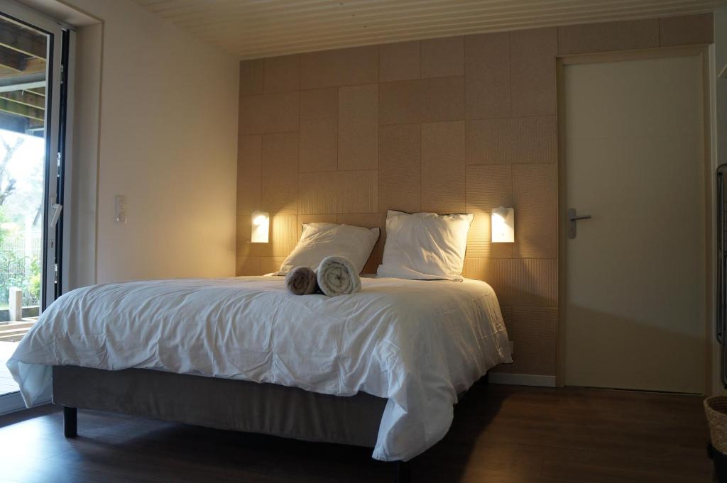 Postel nebo postele na pokoji v ubytování Mimis House