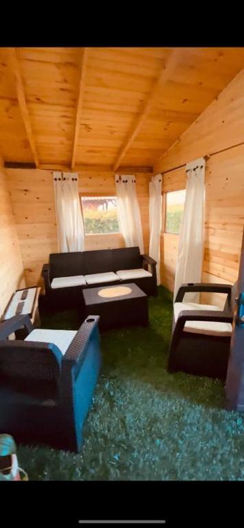 Postel nebo postele na pokoji v ubytování CABAÑAS VILLA INES DE SUESCA