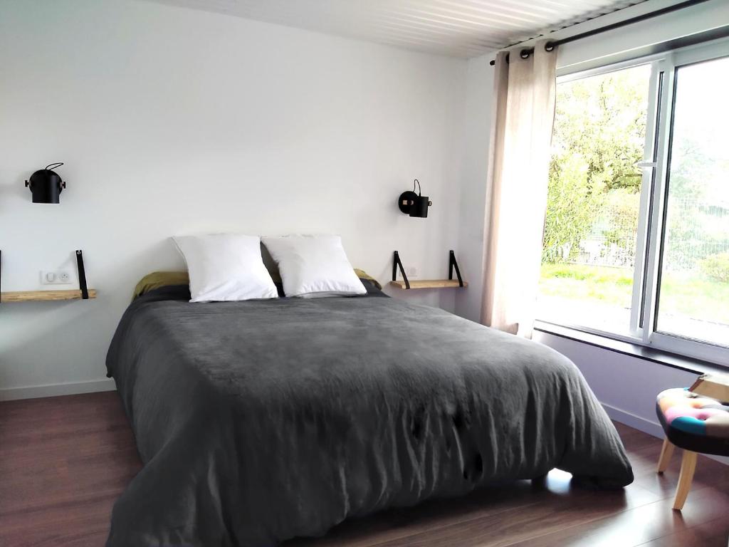 Postel nebo postele na pokoji v ubytování Mimis House