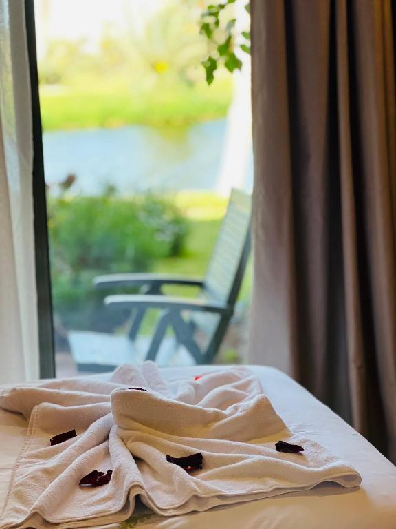Postel nebo postele na pokoji v ubytování Pavillon du Golf -Palmeraie suites
