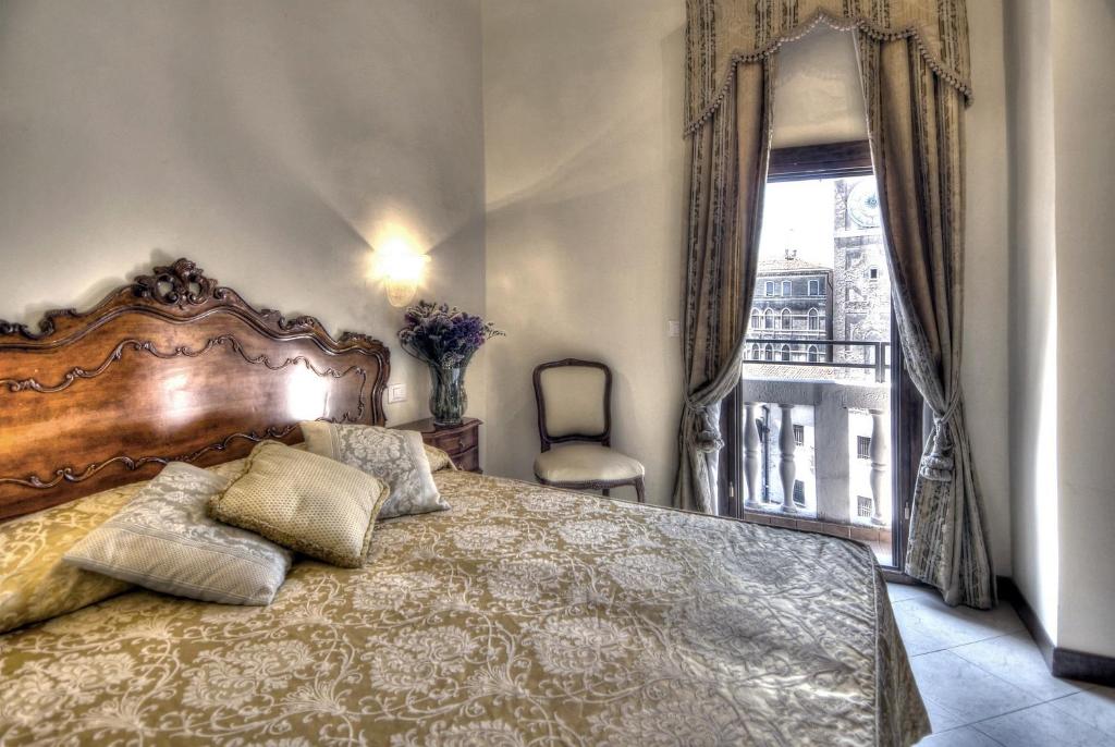 Postel nebo postele na pokoji v ubytování Hotel Scandinavia - Relais