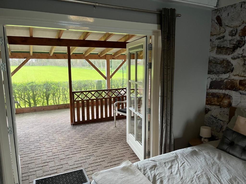 Postel nebo postele na pokoji v ubytování B&B Hoeve Fraai Achterhoek
