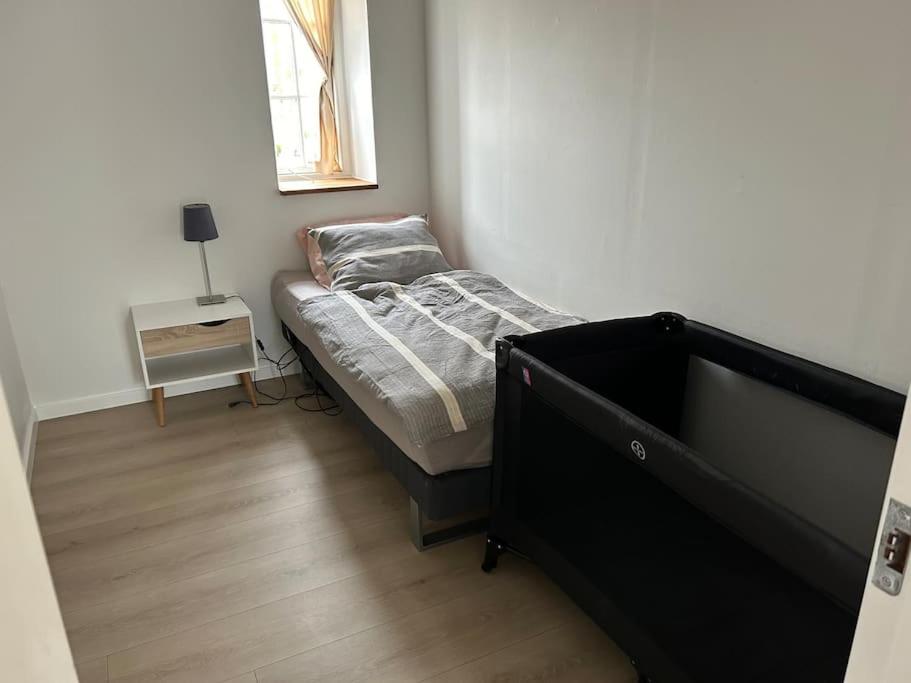 Postel nebo postele na pokoji v ubytování Villa vue saksild strand