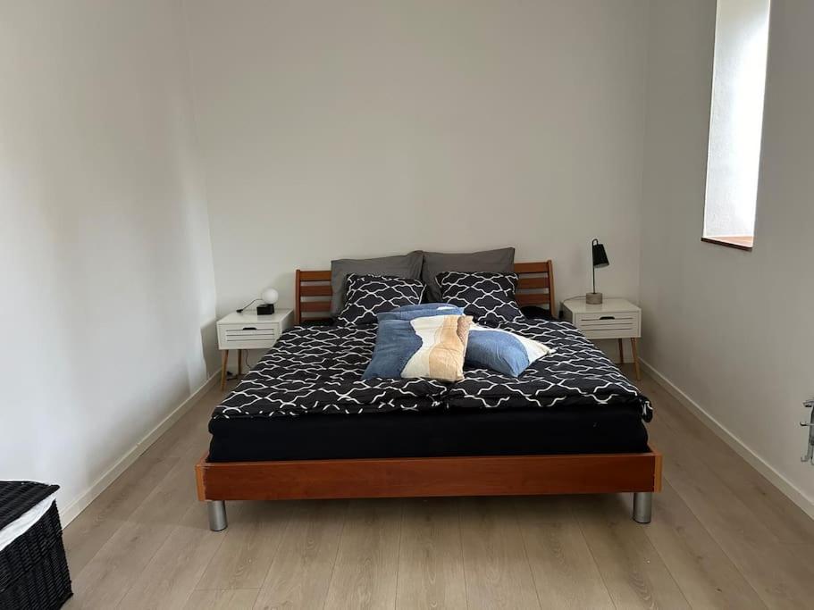 Postel nebo postele na pokoji v ubytování Villa vue saksild strand
