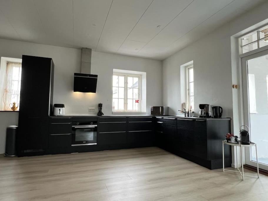 Kuchyň nebo kuchyňský kout v ubytování Villa vue saksild strand