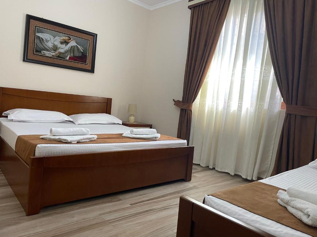 Uma cama ou camas num quarto em Apartment Koka