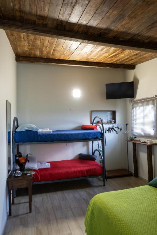 Postel nebo postele na pokoji v ubytování Filuvespri