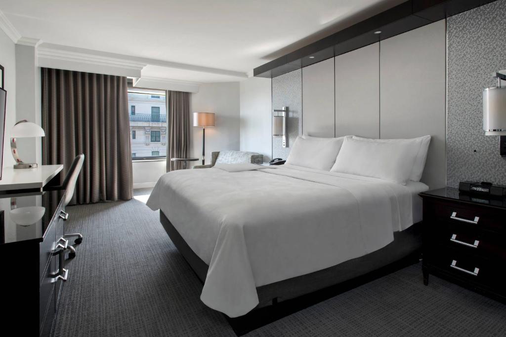 Postel nebo postele na pokoji v ubytování JW Marriott Washington, DC