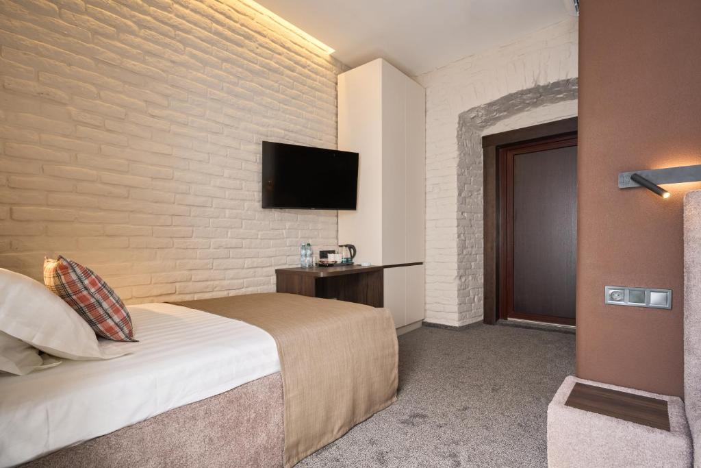 TV a/nebo společenská místnost v ubytování FIMKA Apart Hotel