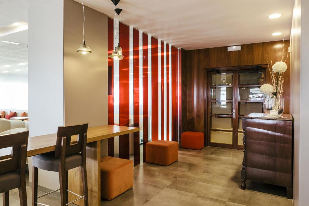 Kuchyň nebo kuchyňský kout v ubytování Hotel Montecarlo Spa & Wellness