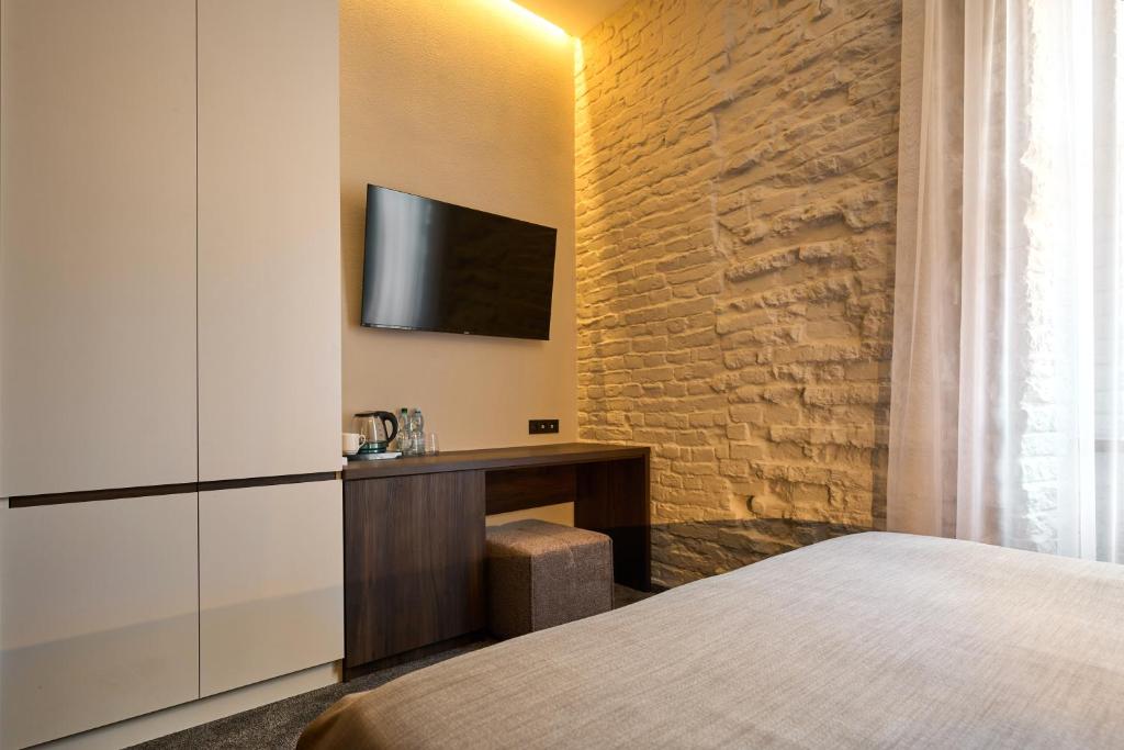 TV a/nebo společenská místnost v ubytování FIMKA Apart Hotel