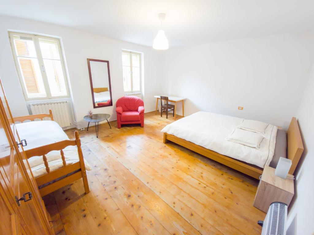 Voodi või voodid majutusasutuse Apartma Florent toas
