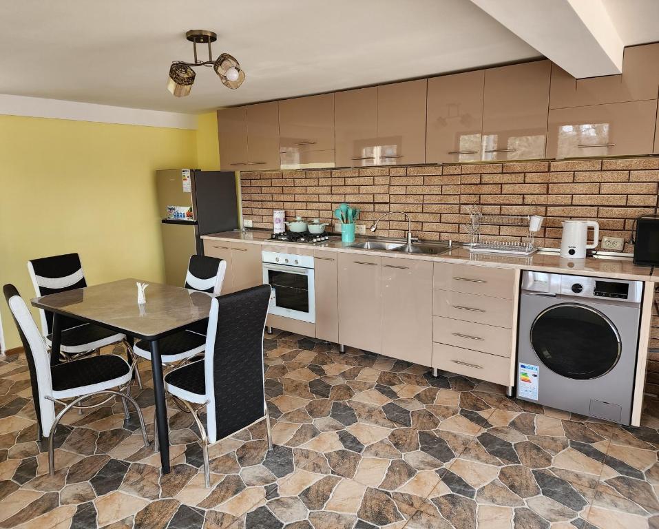 Kuchyň nebo kuchyňský kout v ubytování Lilia guesthouse