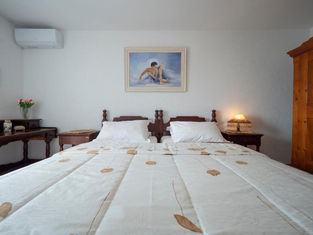 Postel nebo postele na pokoji v ubytování Casa Pastrovici del Mare