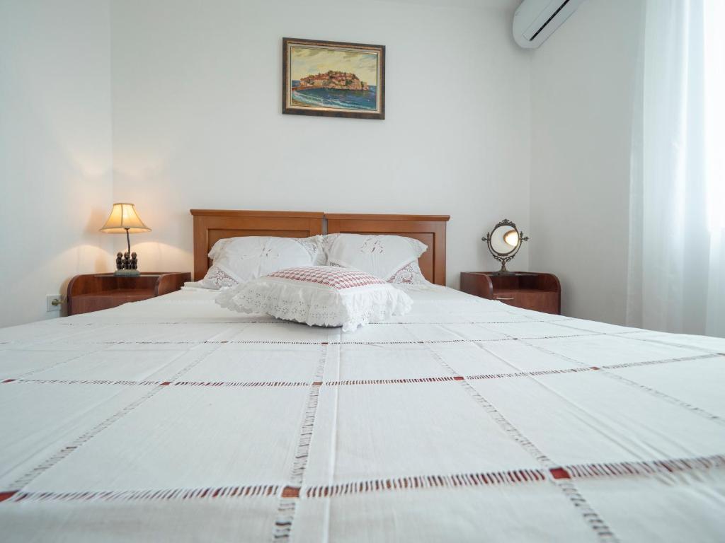 Postel nebo postele na pokoji v ubytování Casa Pastrovici del Mare