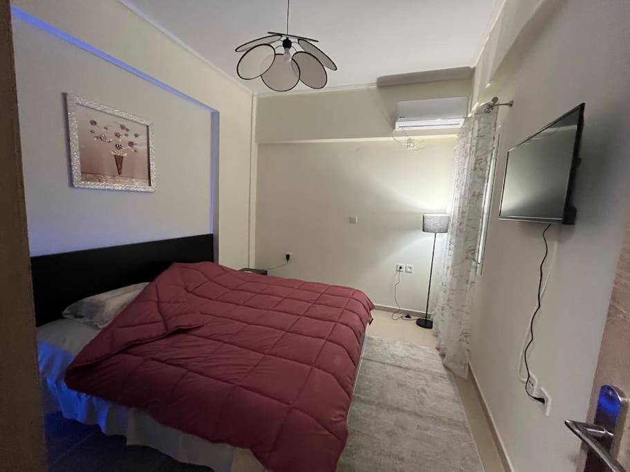 Кровать или кровати в номере Elena s apartment