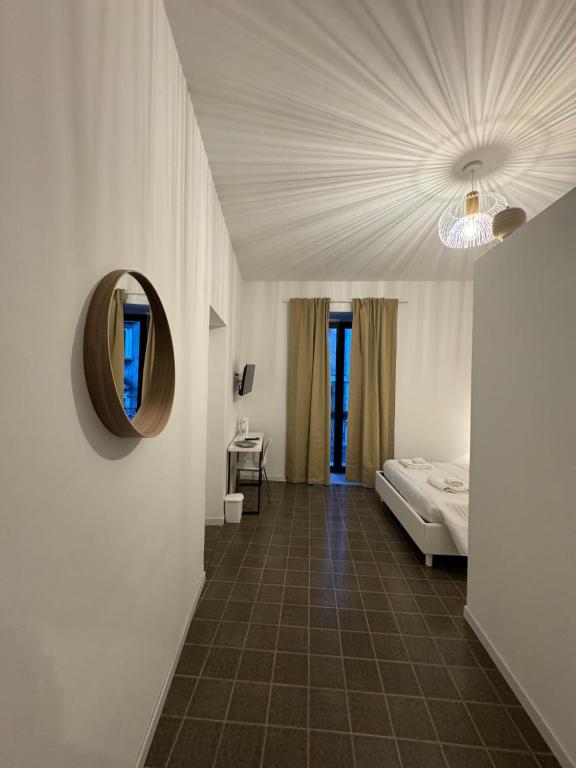 Ένα ή περισσότερα κρεβάτια σε δωμάτιο στο San Giuliano Palace