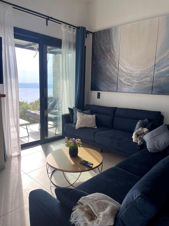 Coin salon dans l'établissement Allure Luxury Villas 3&4 Serenity Retreat
