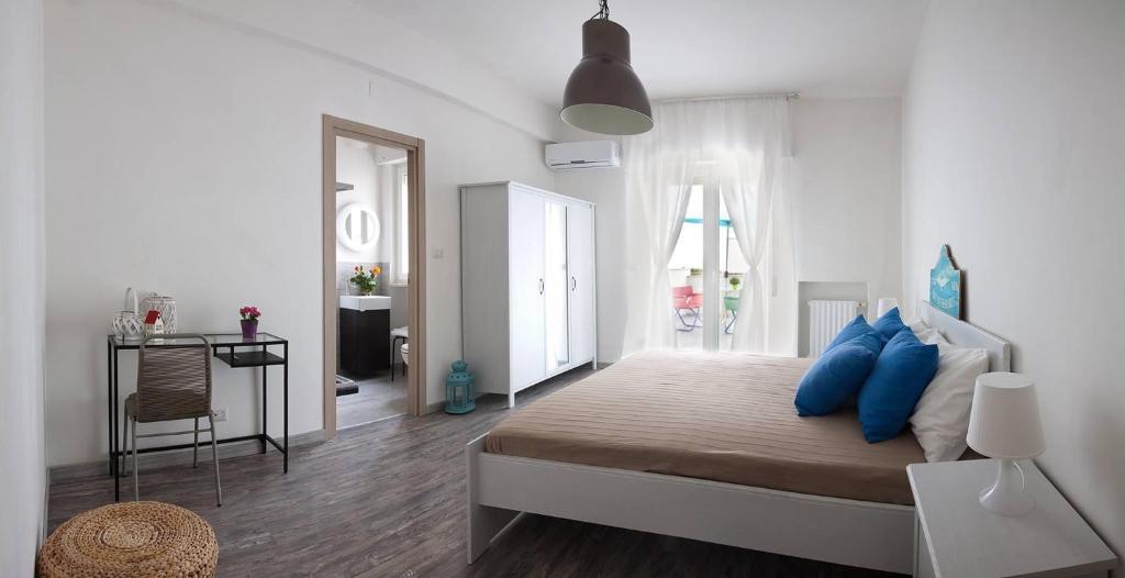 Postel nebo postele na pokoji v ubytování vento di mare