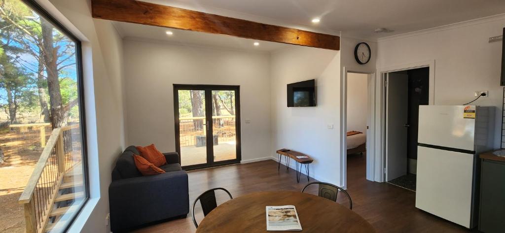 Kuchyň nebo kuchyňský kout v ubytování Glossy Black Cabin