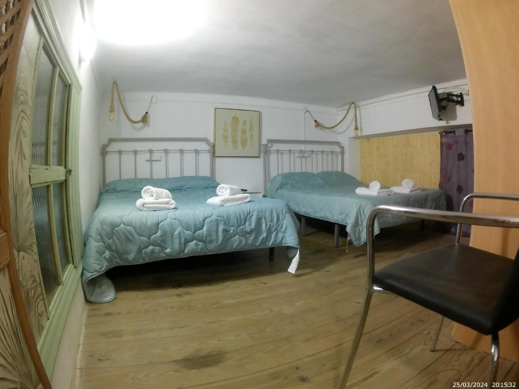 Postel nebo postele na pokoji v ubytování Miguel y Rosa 2