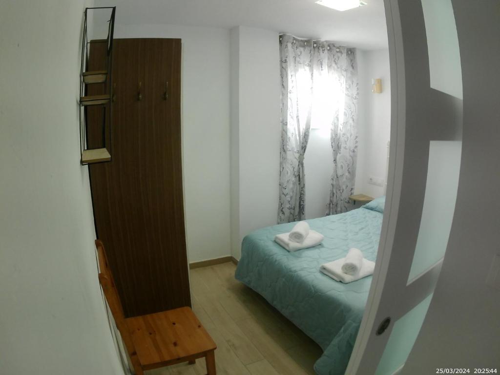 Postel nebo postele na pokoji v ubytování Miguel y Rosa 2