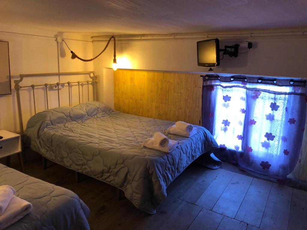 Postel nebo postele na pokoji v ubytování Miguel y Rosa 2