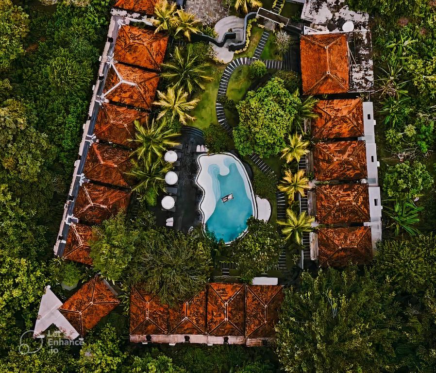 an overhead view of a resort with a swimming pool at ONAYA Bali Resort - Adults Only in Uluwatu