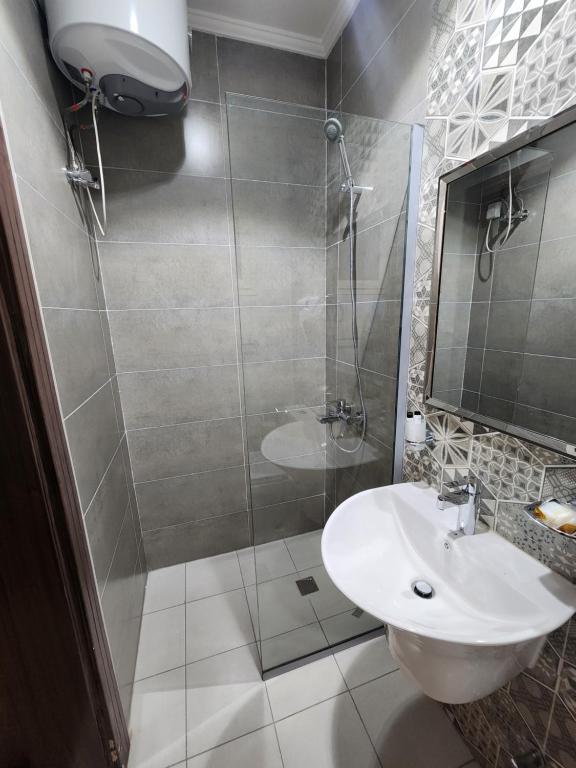 Koupelna v ubytování فندق كنف الشرائع - kanaf hotel Ash Sharāʼi