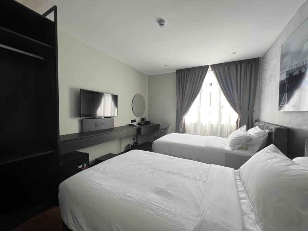 Postel nebo postele na pokoji v ubytování ALL IN HOTEL