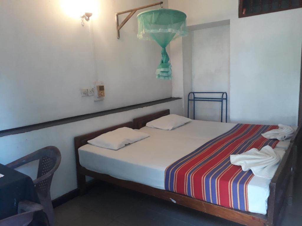 Postel nebo postele na pokoji v ubytování Drop Hostel