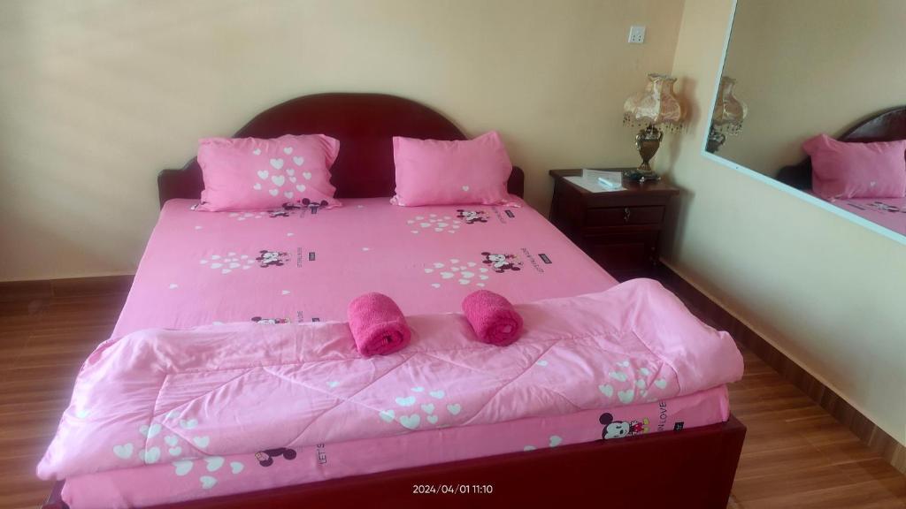 Postel nebo postele na pokoji v ubytování Mabuhay Guesthouse Kampot